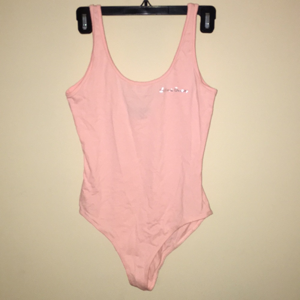pink body suit